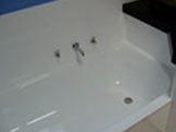 Gleaming white resurfaced bath